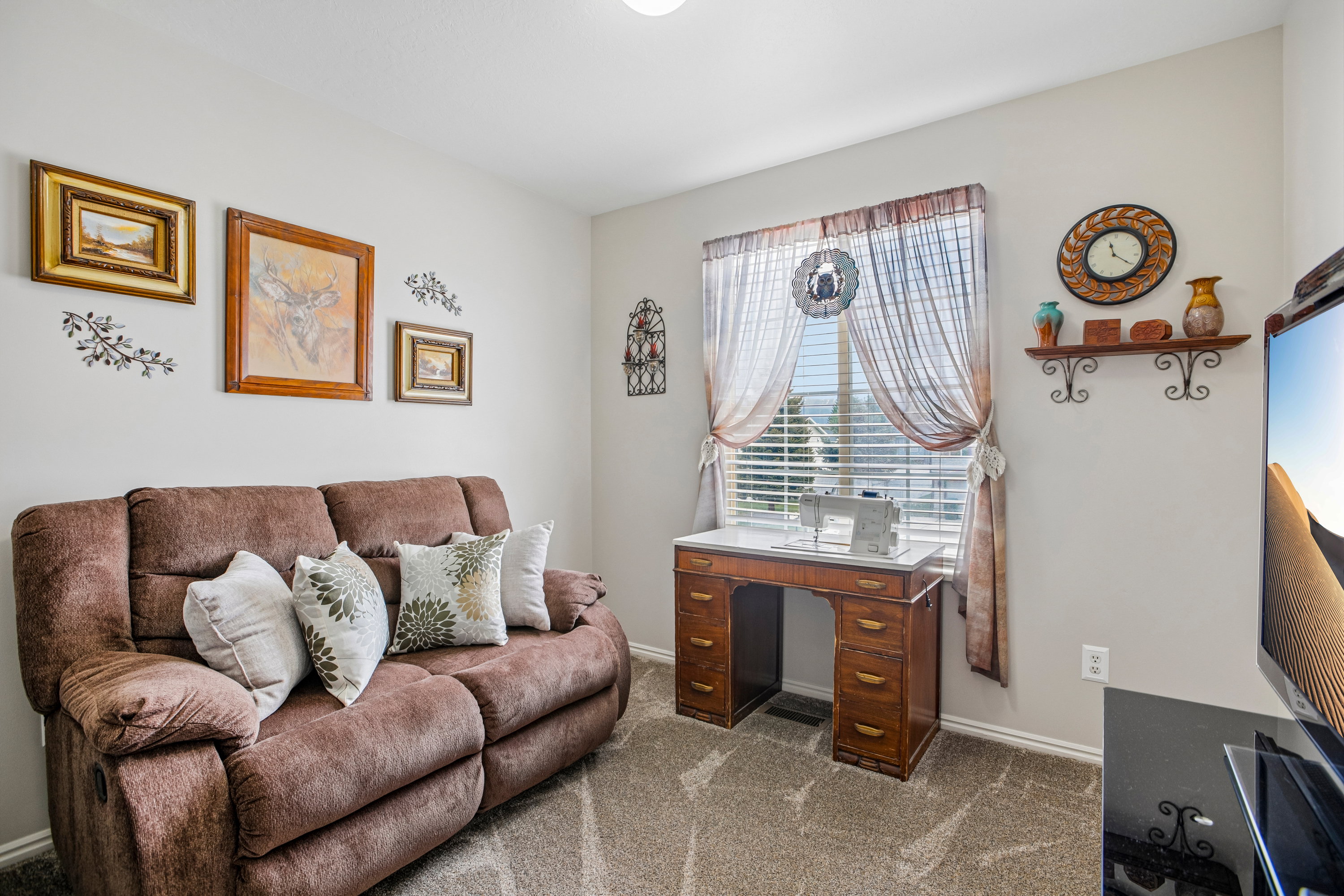 Neutral wall color, wall-to-wall carpeting, window with blinds, and recessed lighting