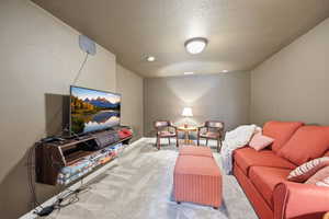 Recessed and flush-mount ceiling lighting illuminate the space