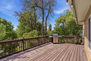 Expansive wood deck with a full railing system