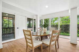 Hardwood-finish flooring extending throughout, complemented by recessed lighting