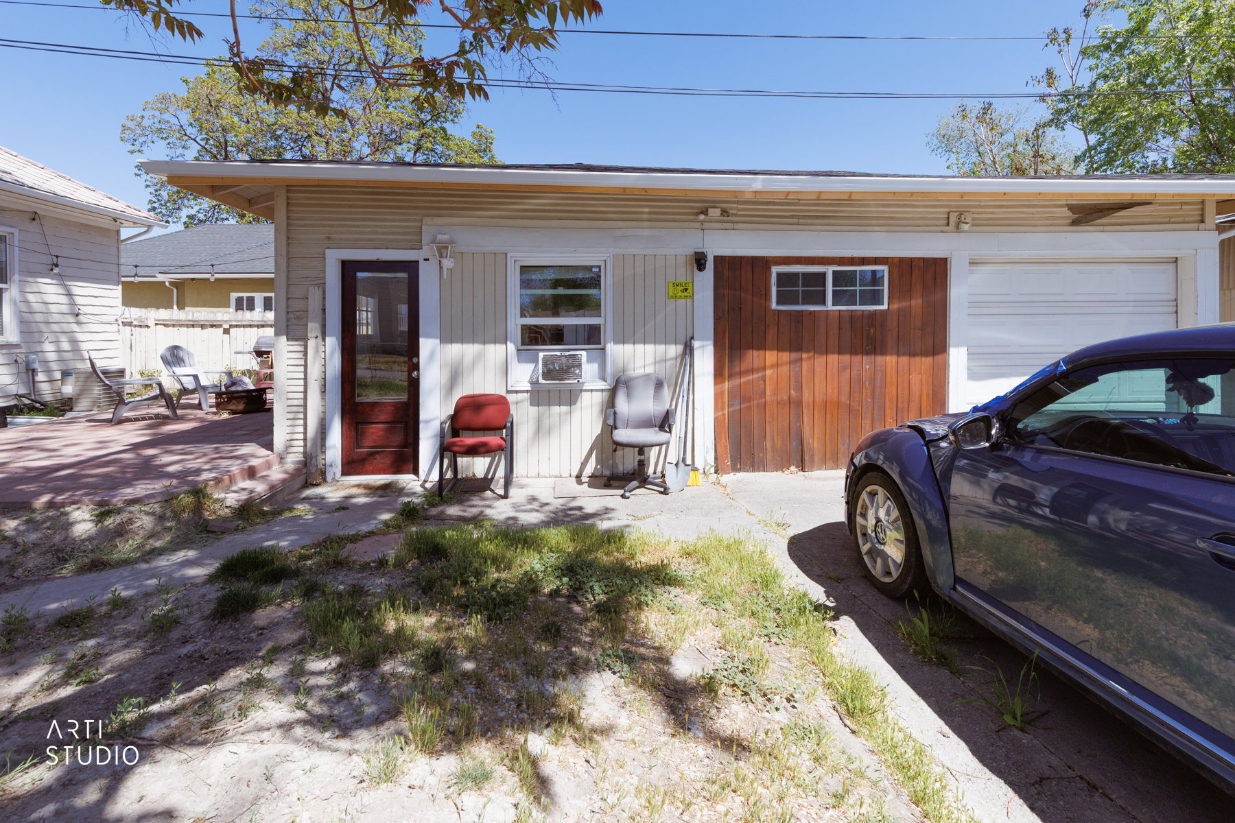 Detached ADU entrance, and garage storage