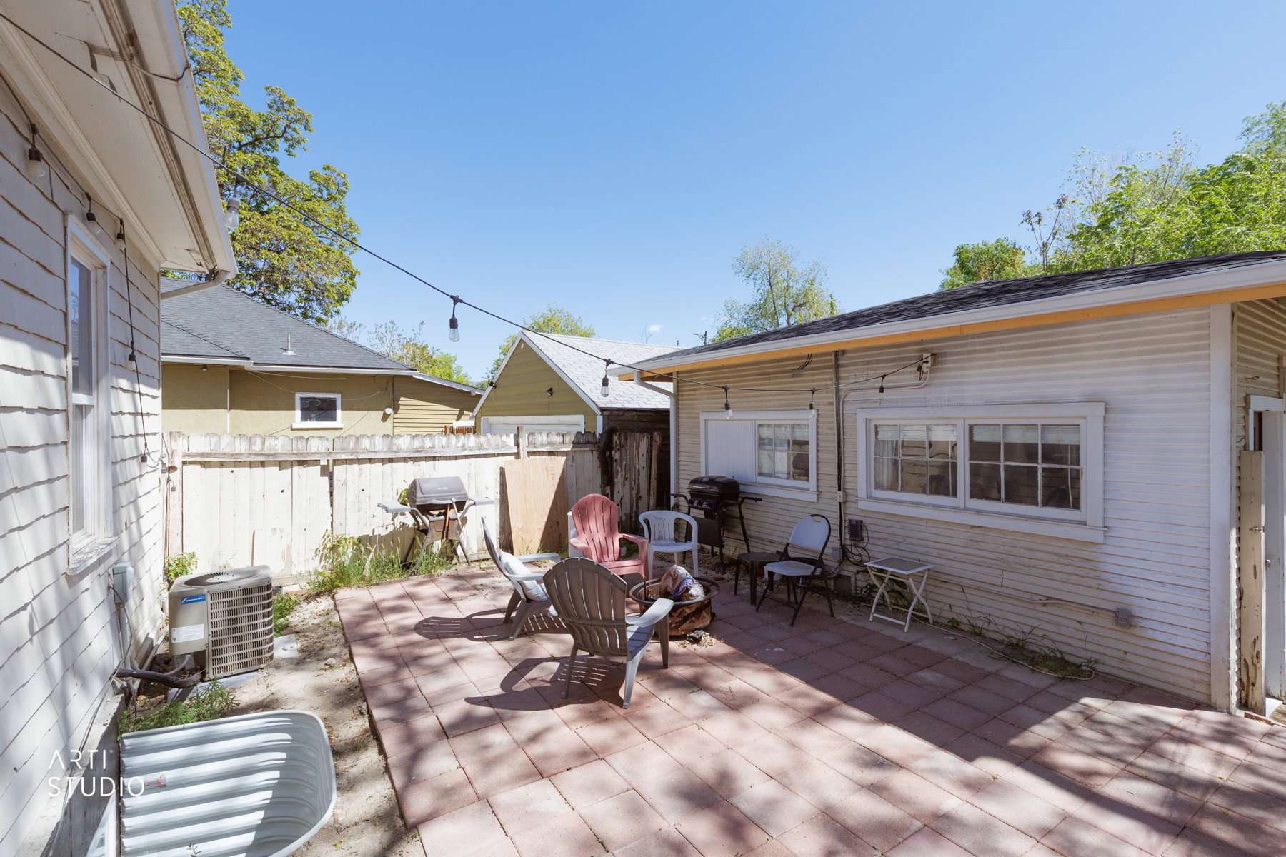 Patio, main house (left), ADU (right)