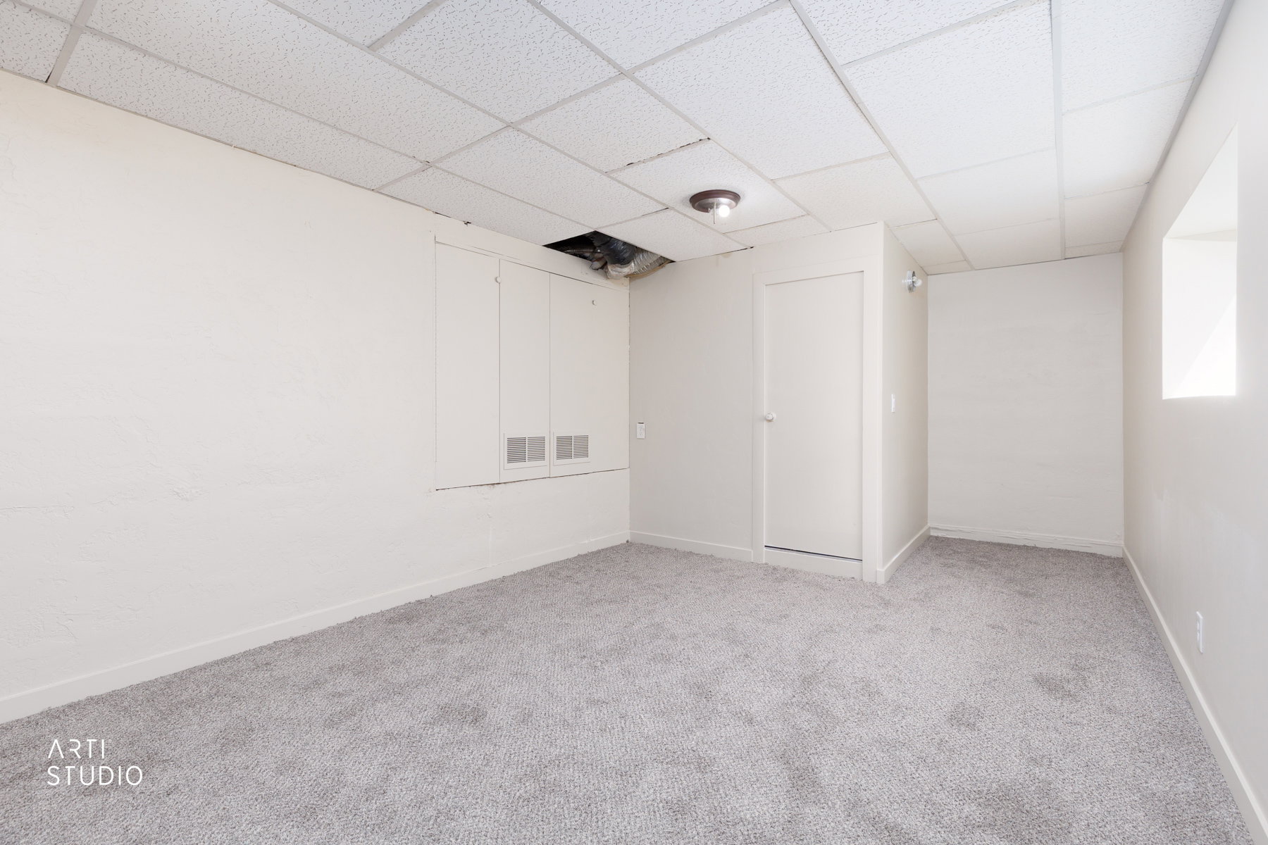 basement, bathroom beyond the door in the middle