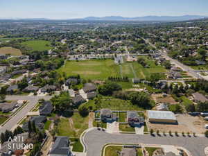 Aerial perspective showcasing residential properties within a developed neighborhood