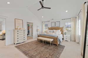 Vaulted ceiling room featuring recessed lighting, a ceiling fan, and carpet flooring