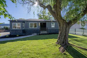 Dark gray exterior with textured stone-look foundation