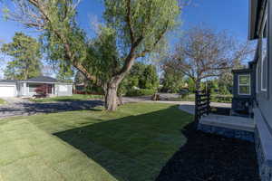 Expansive front yard featuring new sod