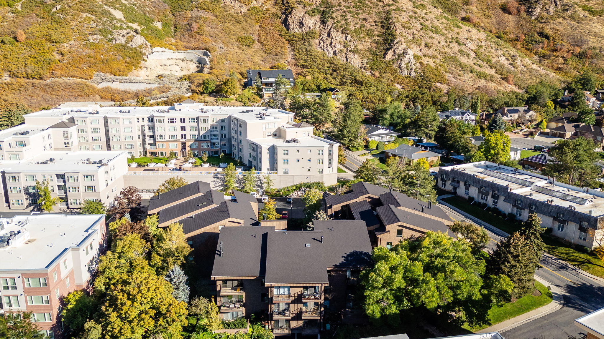 Aerial perspective showcasing multi-story residential buildings with varied architectural styles
