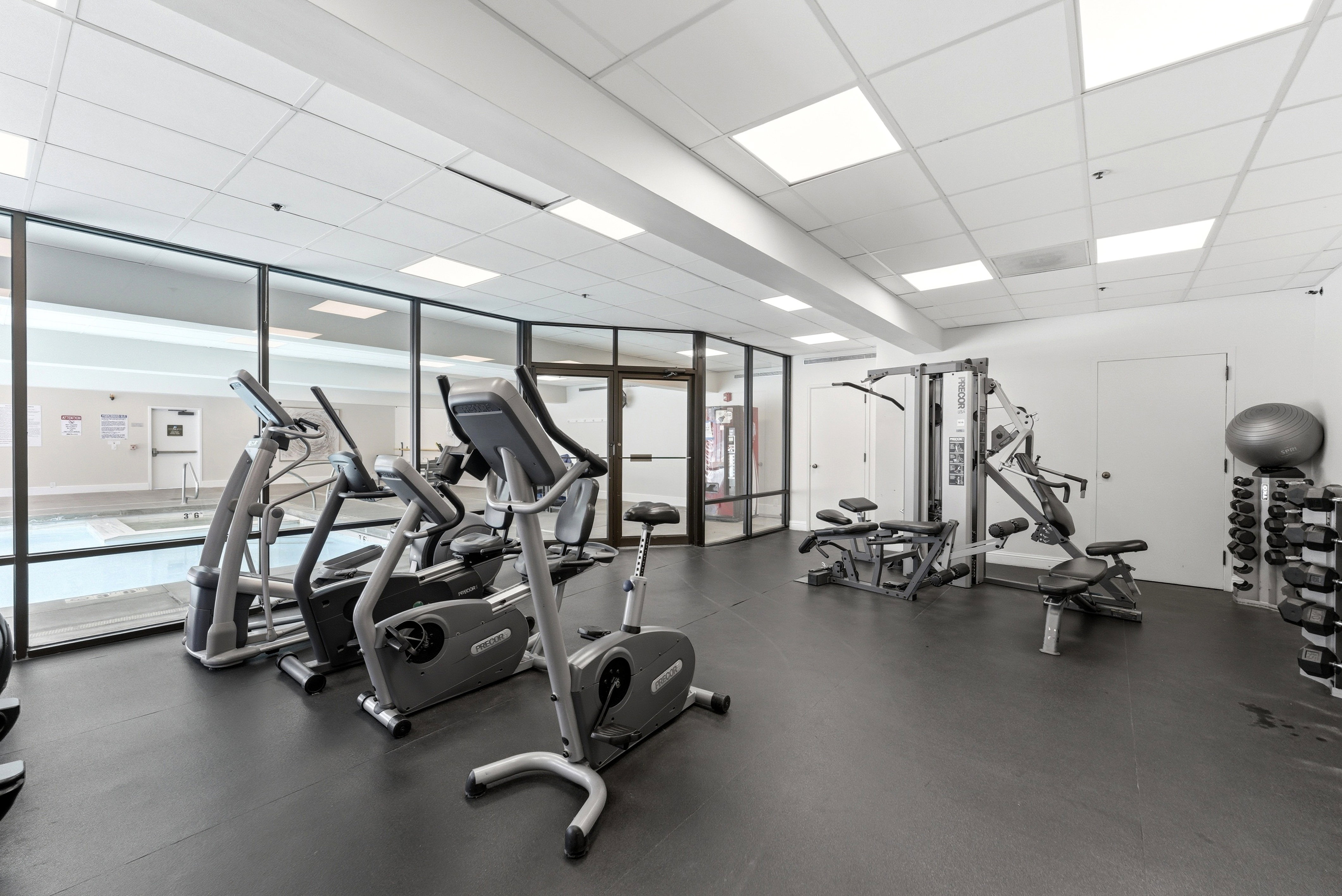 Exercise room featuring a drop ceiling