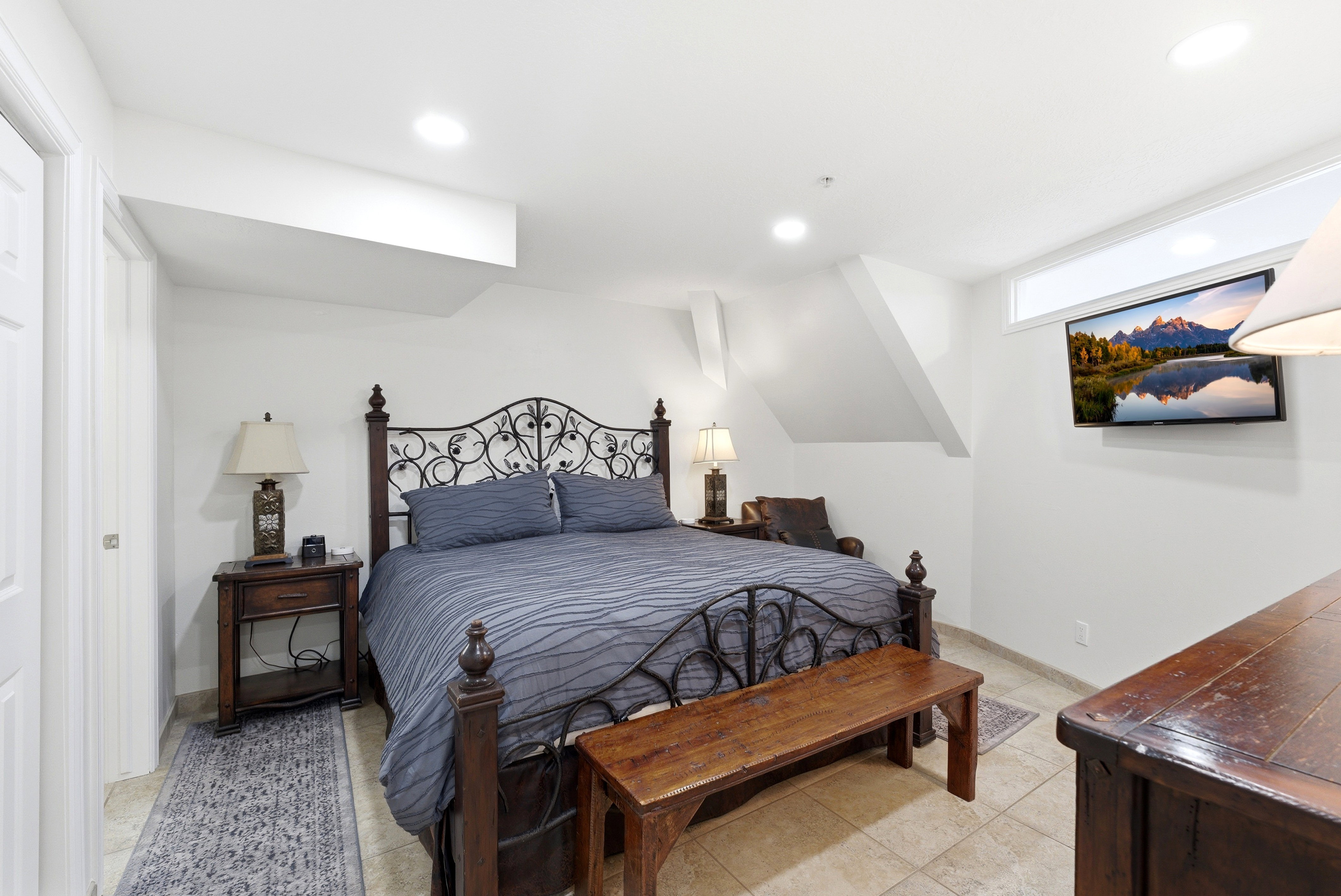 Bedroom with baseboards and recessed lighting