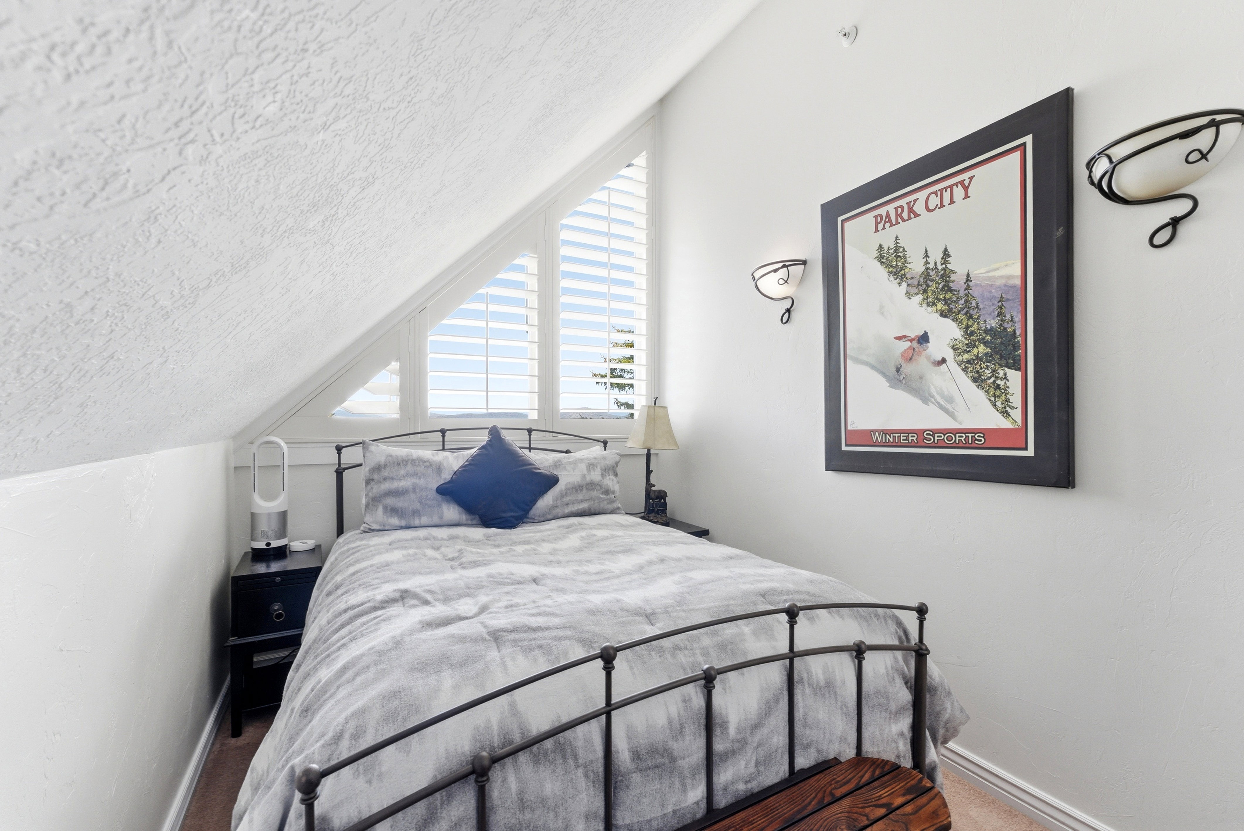 Carpeted bedroom featuring baseboards