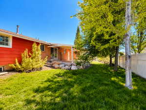 Back of property with a patio area