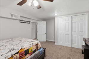 Carpeted room featuring a ceiling fan with integrated lighting, recessed lighting, white trim, and a white six-panel bi-fold closet door