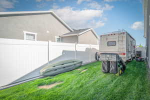 View of fenced backyard