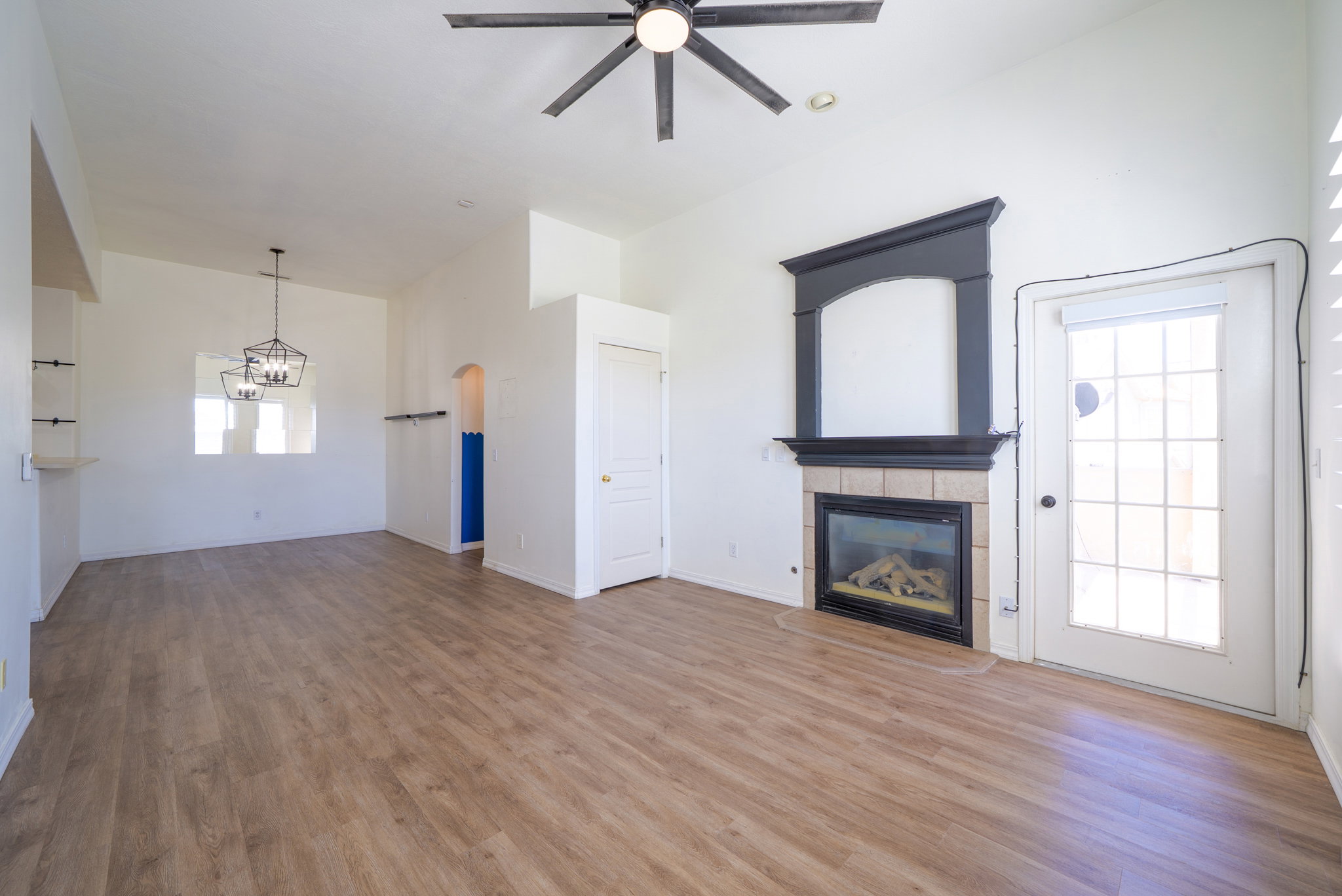 Living room with door to private balcony