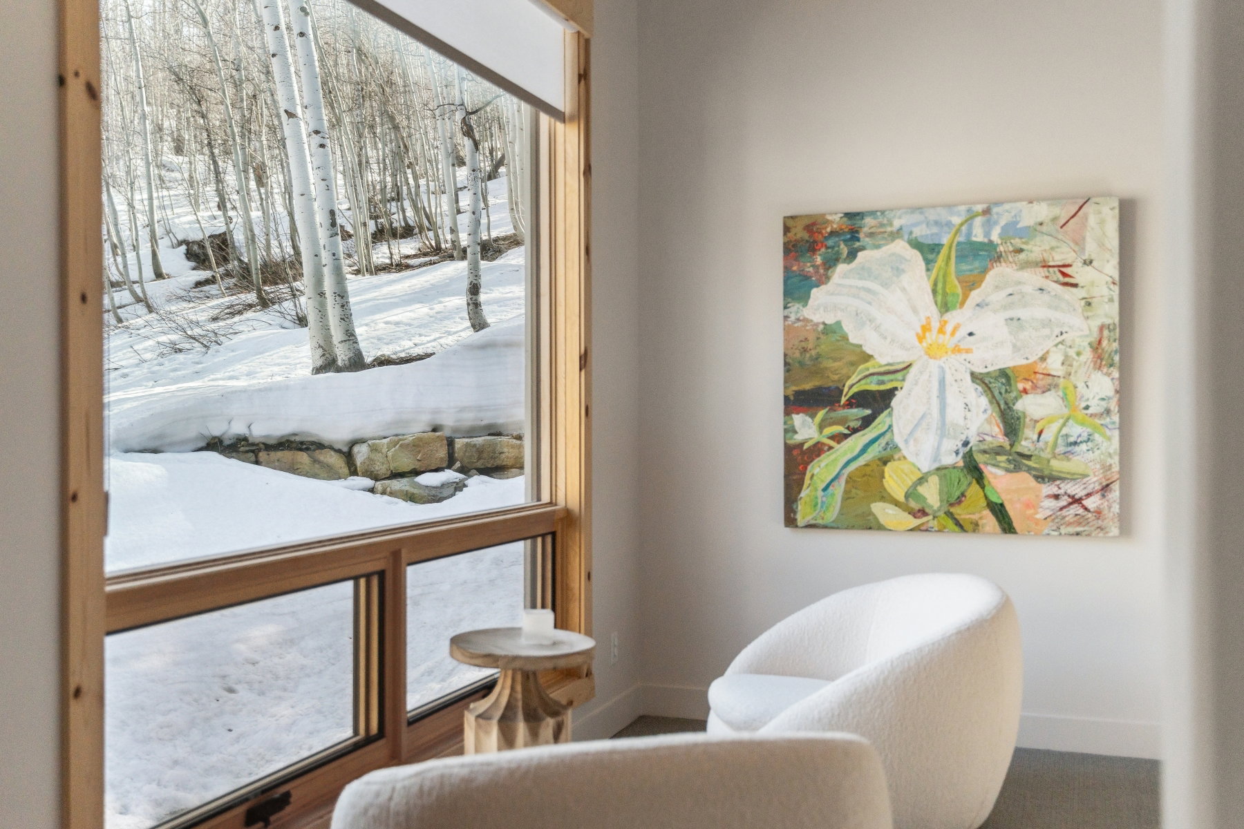 Tall windows with natural wood framing
