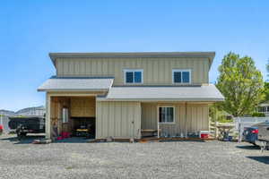 Multi-level shed and workshop with utilities