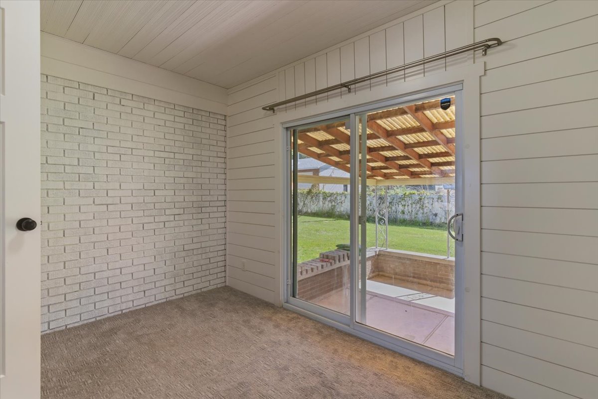 Sliding glass door opening to an outdoor patio