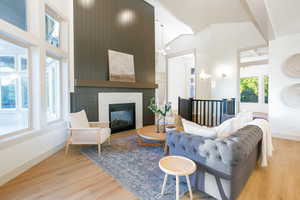 Great room with expansive windows and high ceilings