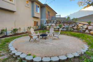 Circular gravel patio featuring concrete border blocks