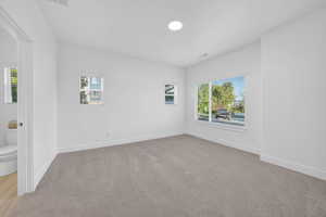 Spacious Main floor primary suite. Multiple windows, incredible natural light, Ensuite Bathroom, Walk-in closet
