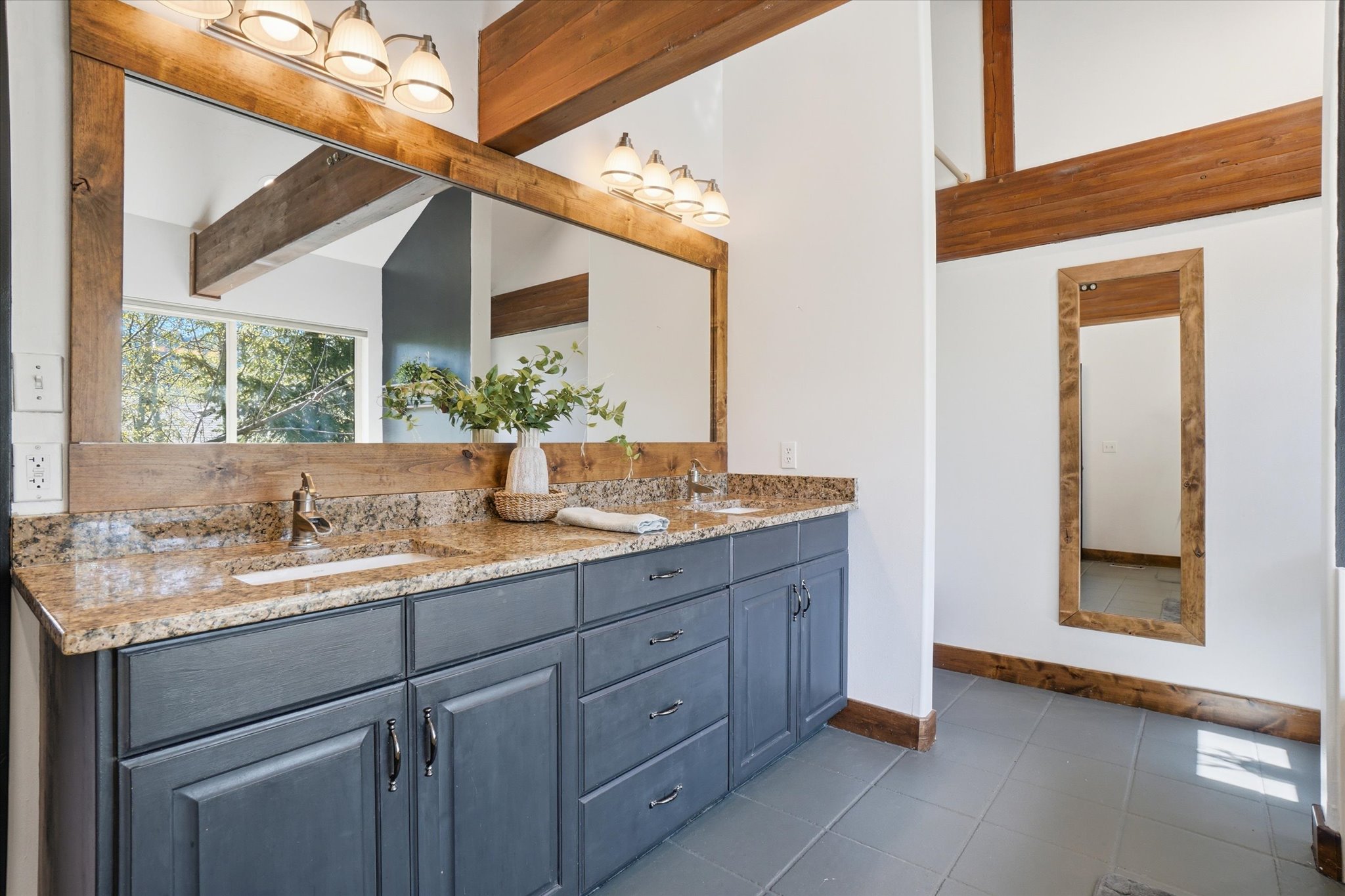 Primary double vanity with granite top