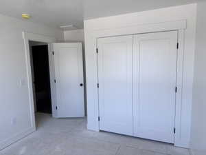 White bi-fold closet doors with black hardware