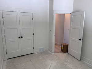 Neutral wall paint complemented by white trim and baseboards