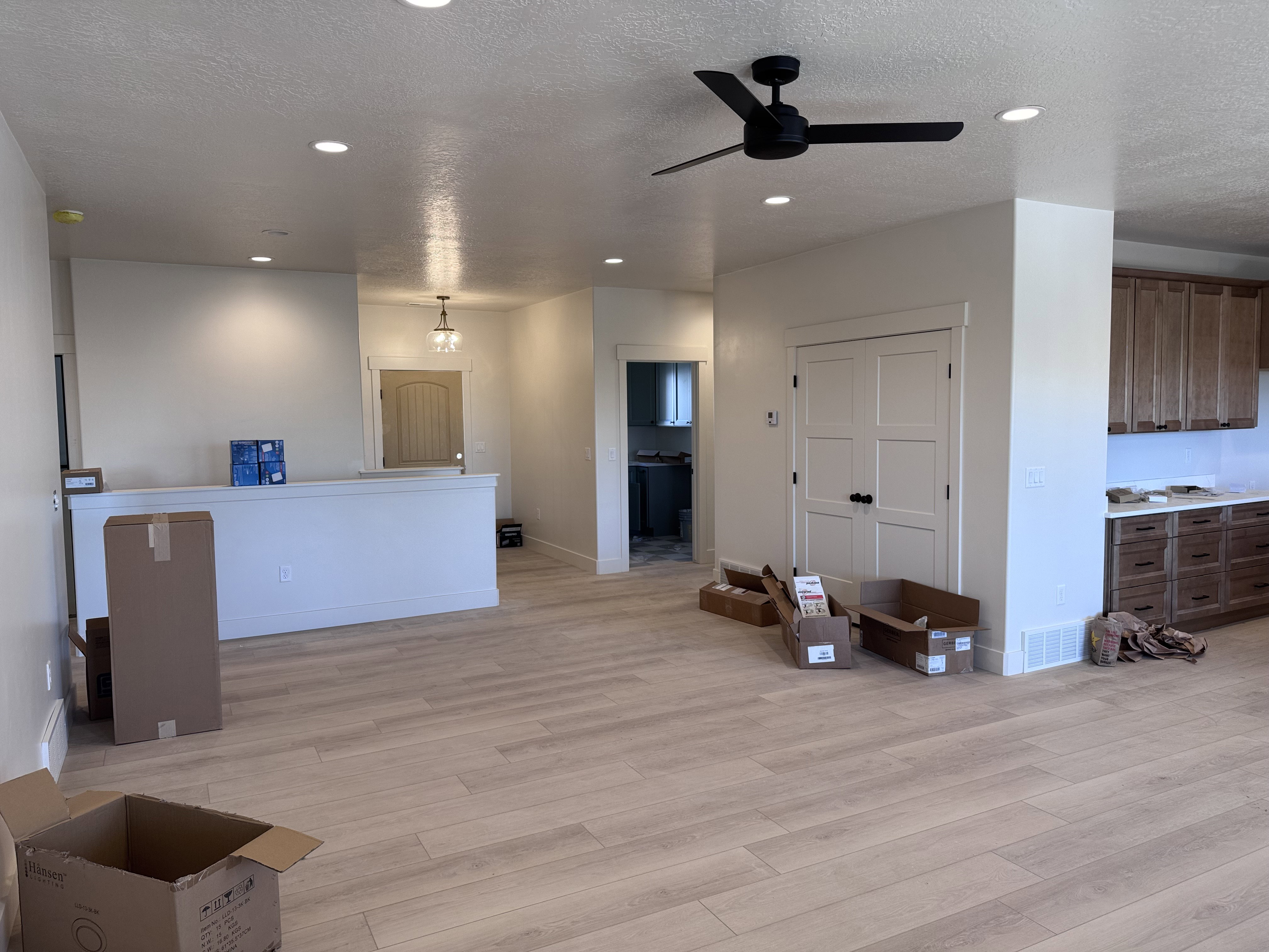 Spacious interior featuring wood-finish plank flooring throughout