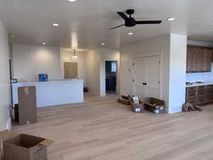 Spacious interior featuring wood-finish plank flooring throughout