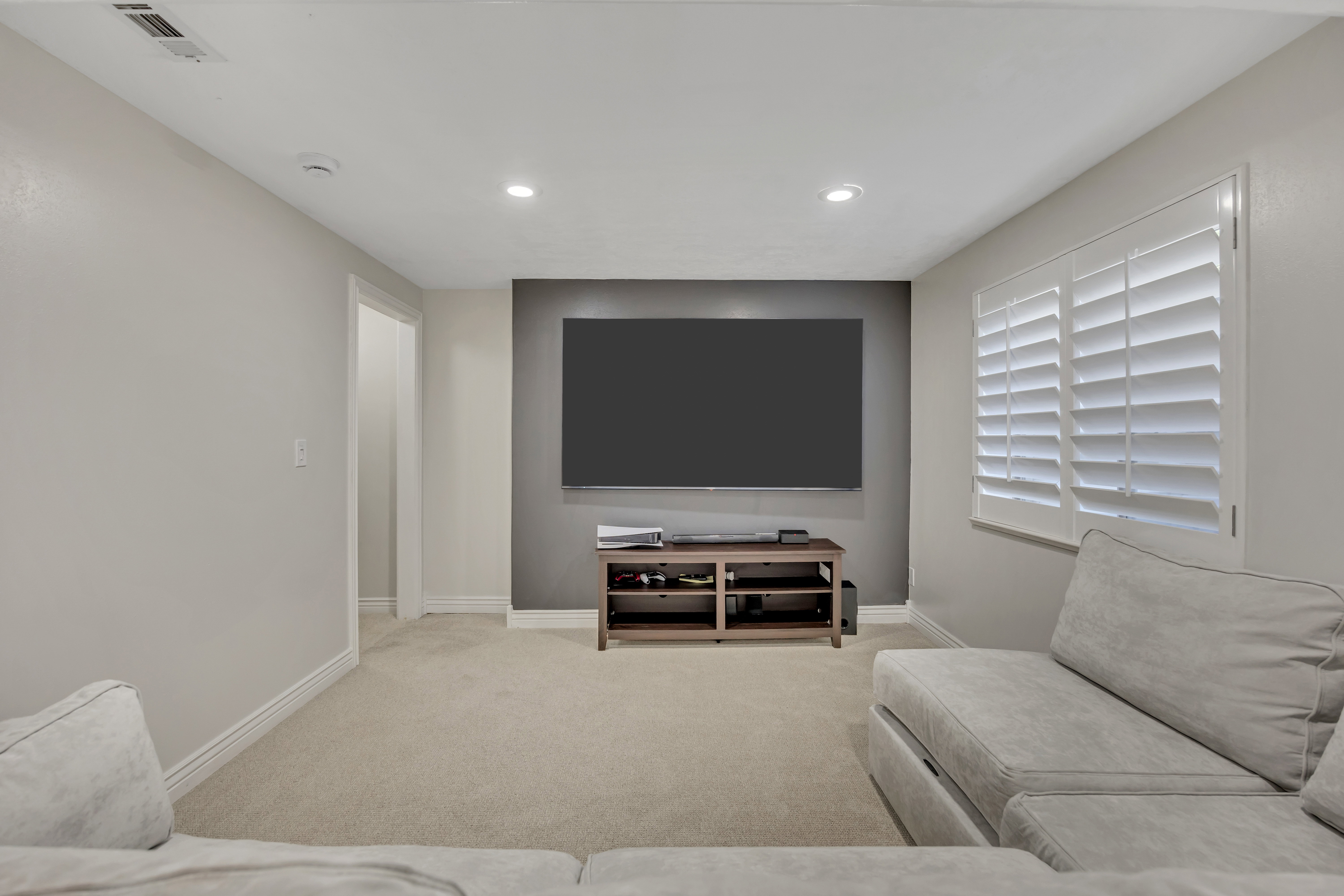 Theatre Living Room featuring recessed lighting and light gray walls