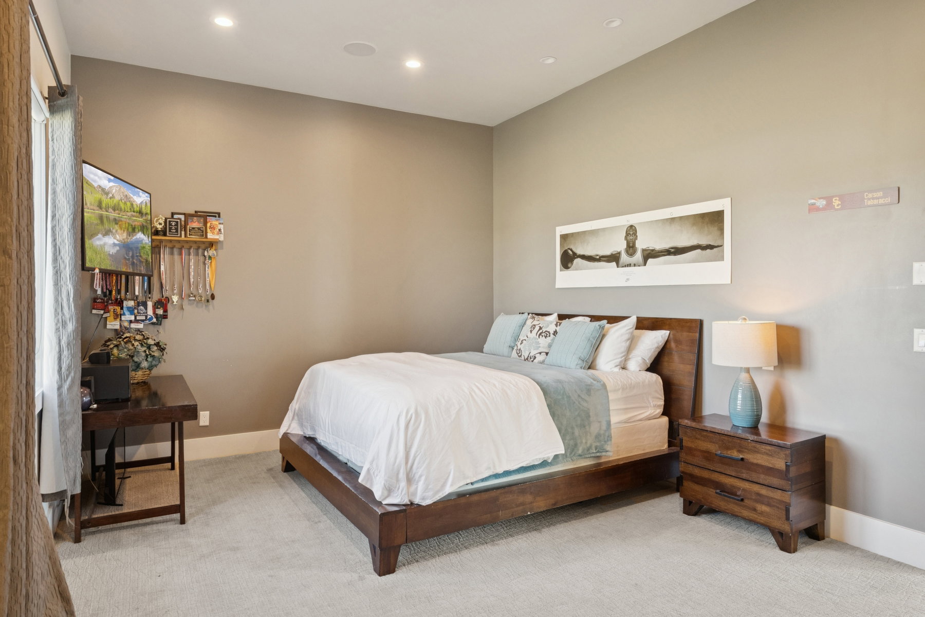 Bedroom featuring recessed lighting, light-toned wall paint, and light-colored carpet flooring