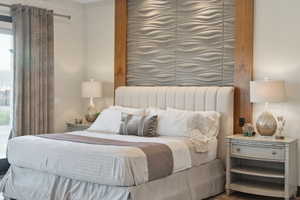Accent wall with textured paneling and wood-finish trim