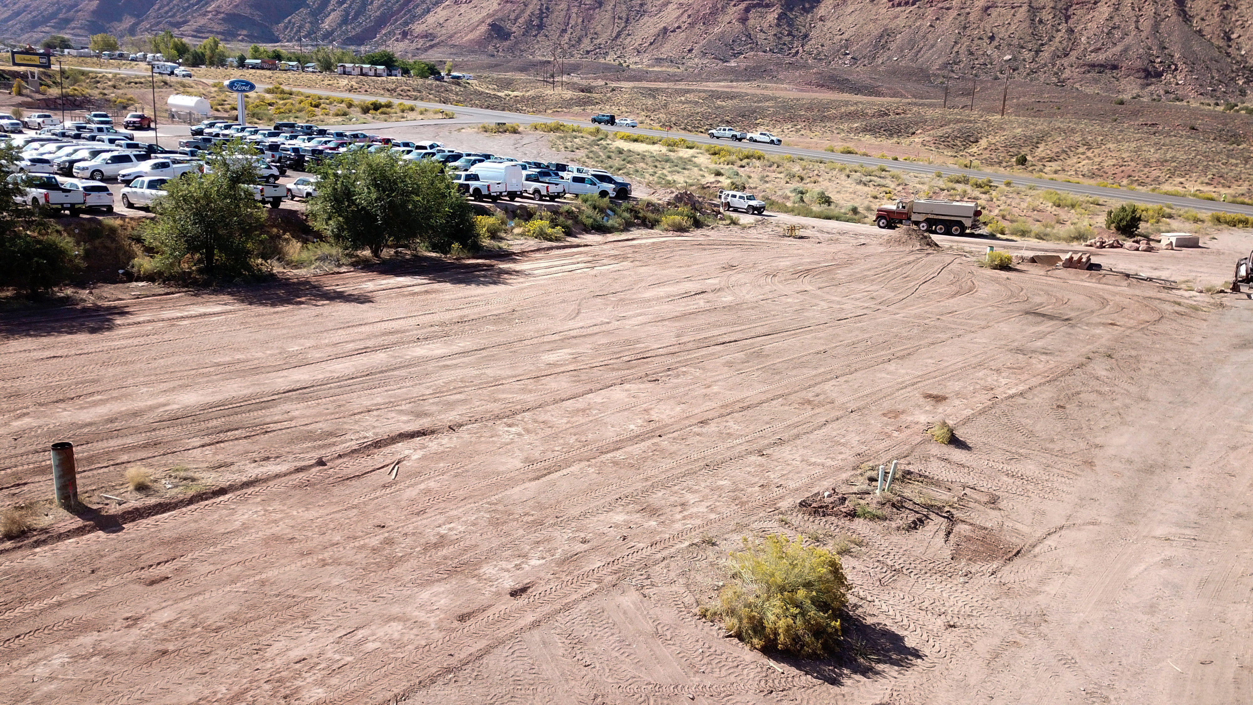 Expansive cleared lot with visible utility stub-outs