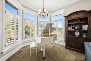 Bay window with plantation shutters and mountain scenery