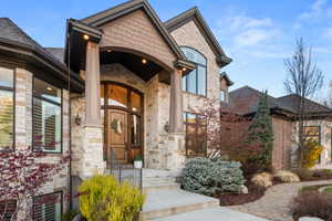 Stone and brick façade with gabled roof lines