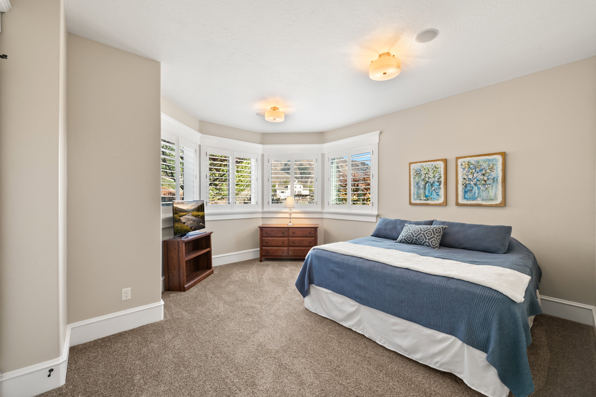 Bay window with white plantation shutters