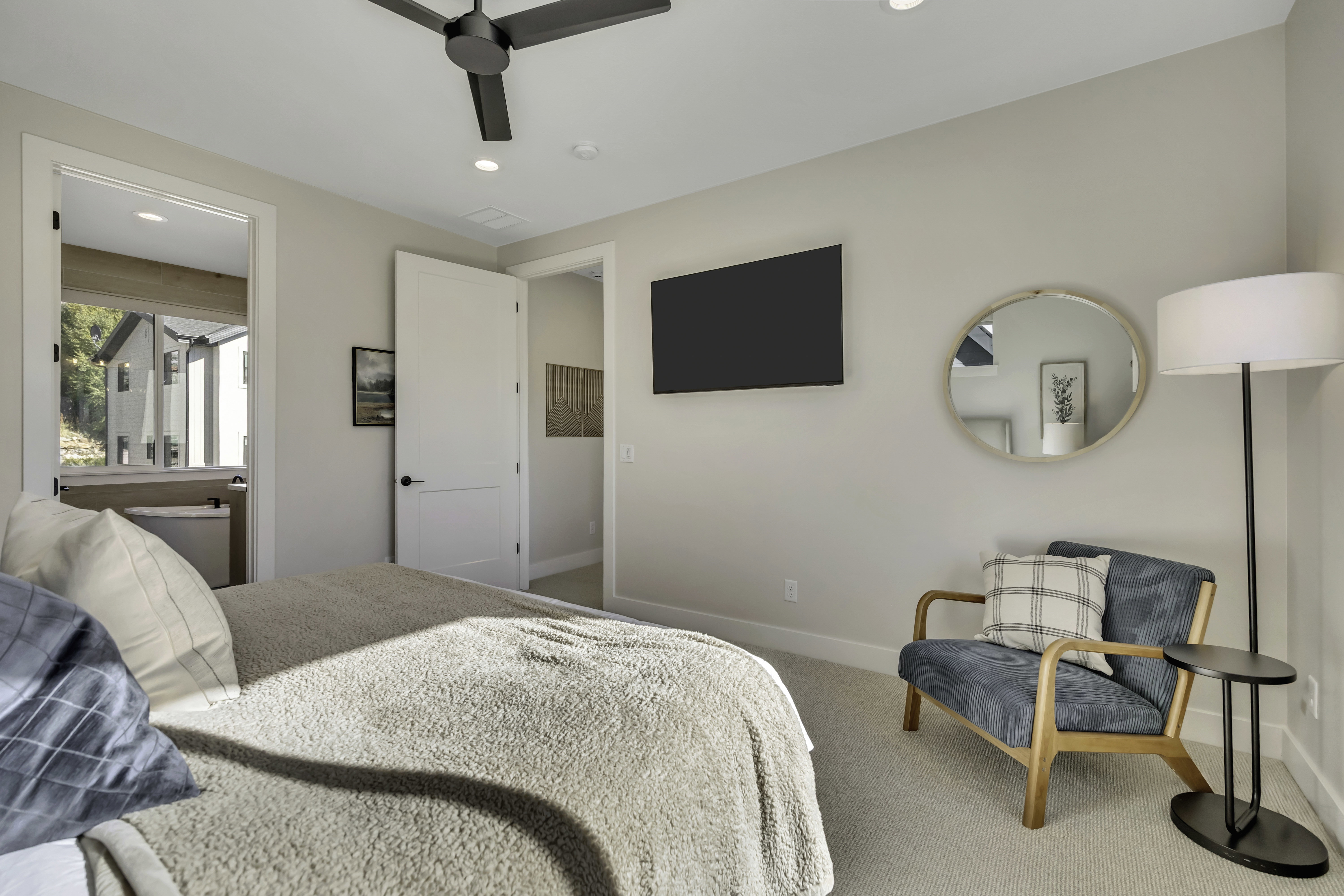 Carpeted bedroom with recessed lighting and ceiling fan