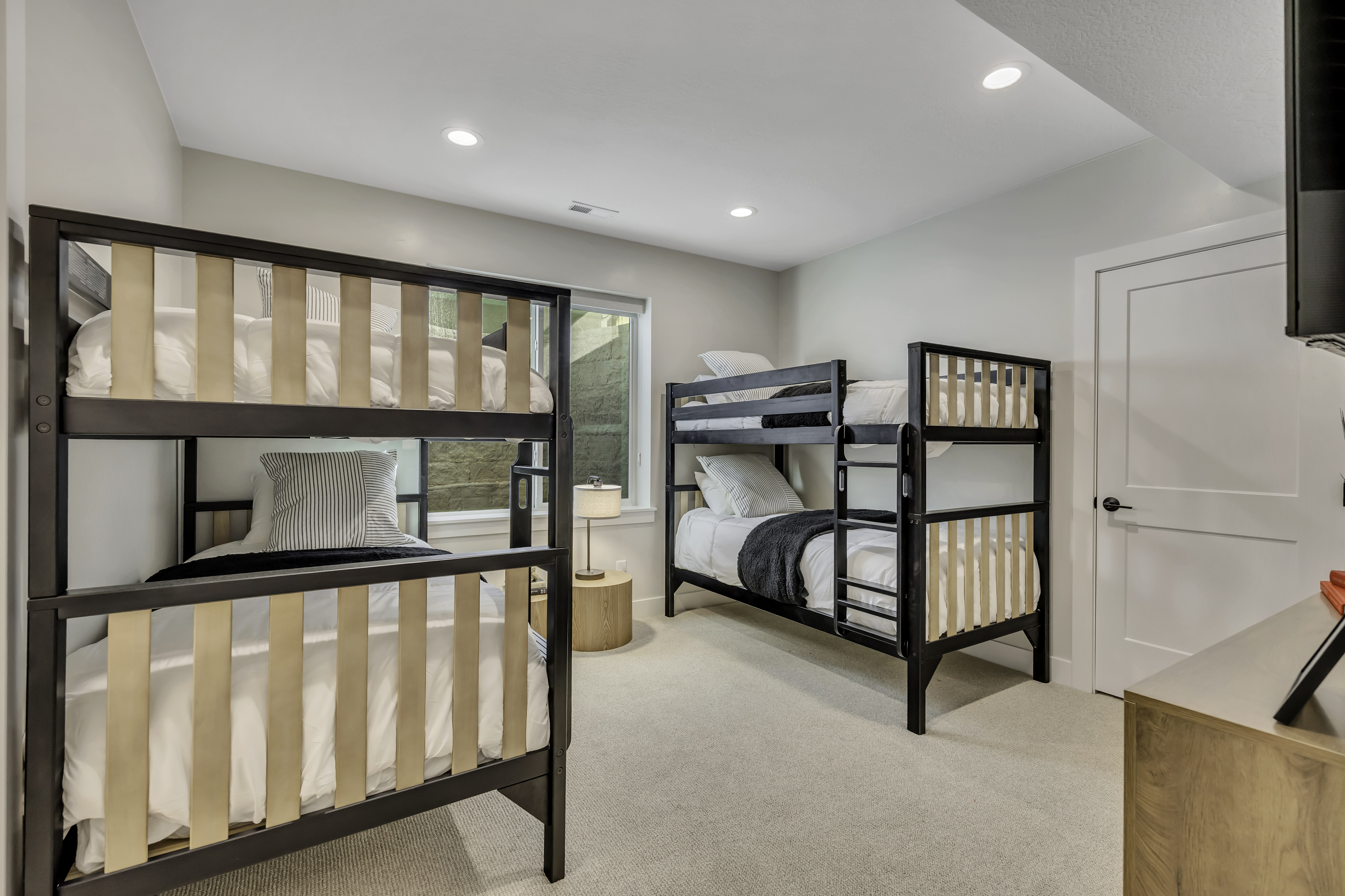 Bedroom featuring light colored carpet and recessed lighting