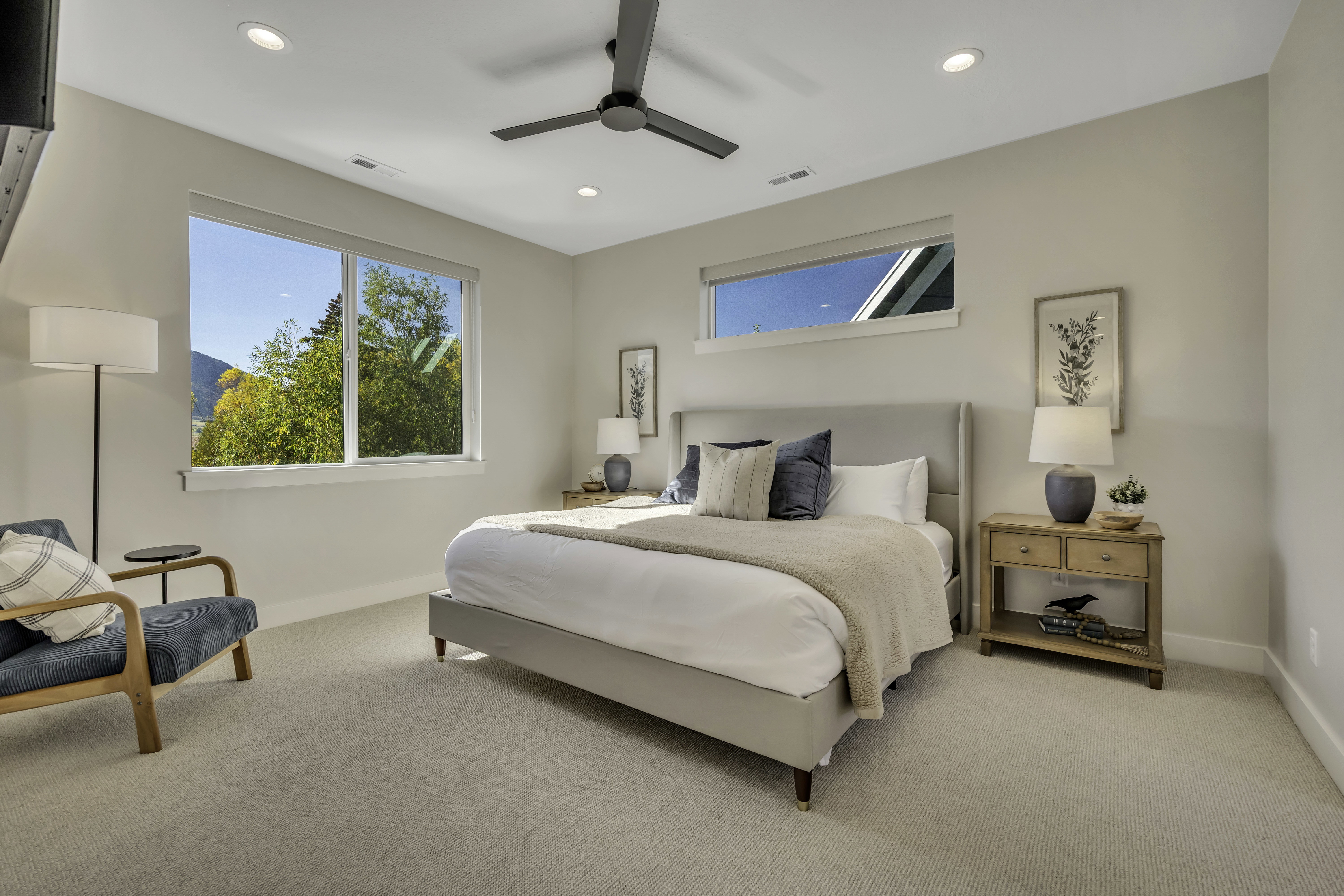 Carpeted bedroom featuring recessed lighting and ceiling fan