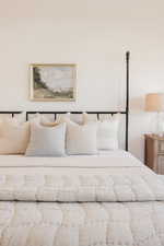 Light-toned wall with a framed landscape artwork