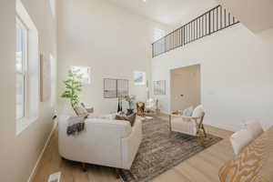 Vaulted ceilings with abundant natural light from multiple windows