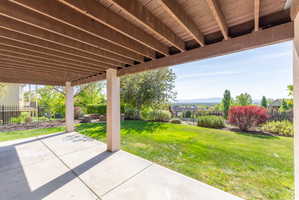 Covered patio with concrete flooring offering outdoor living space