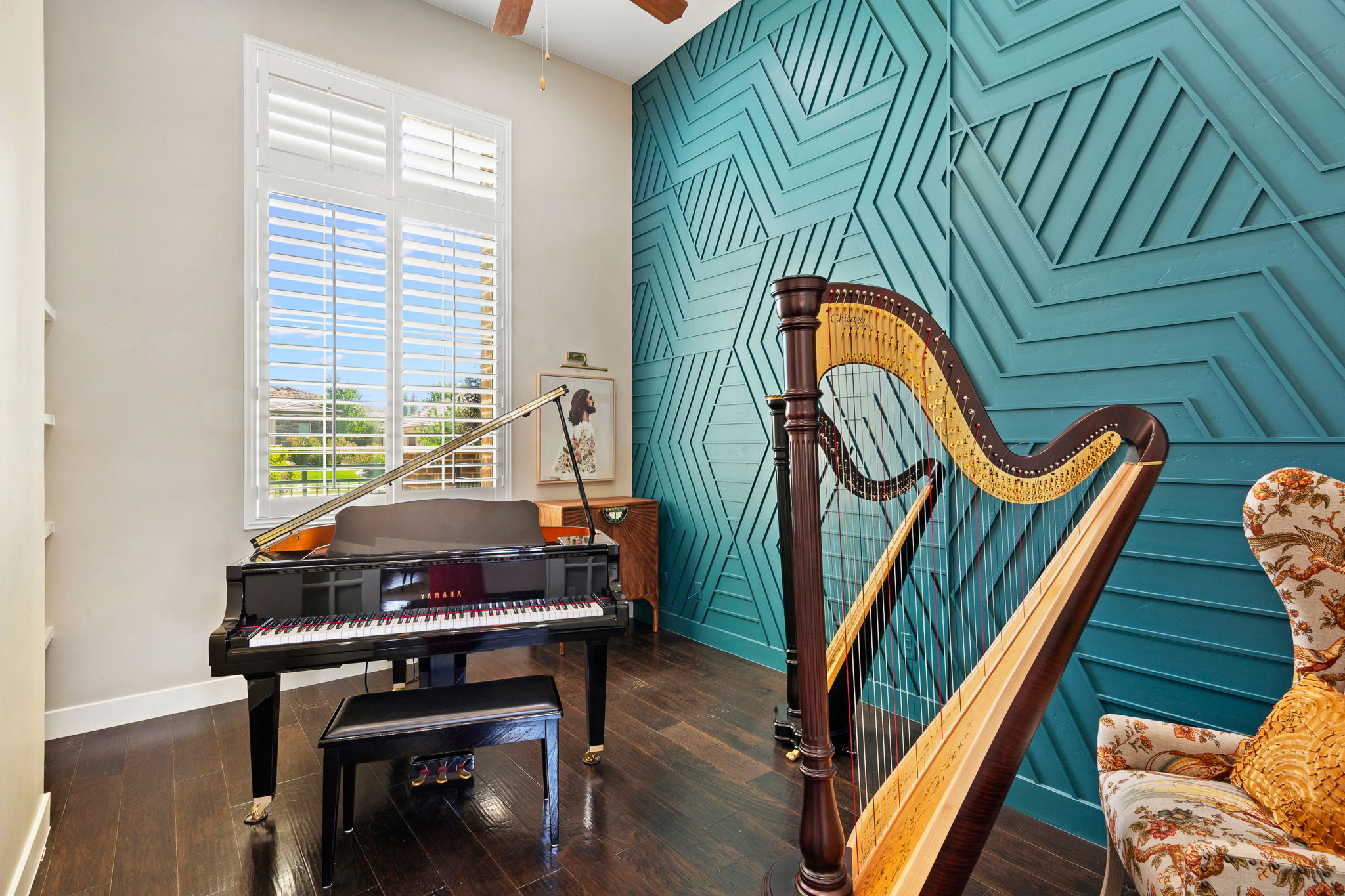 Accent wall featuring geometric paneling and a vibrant teal finish