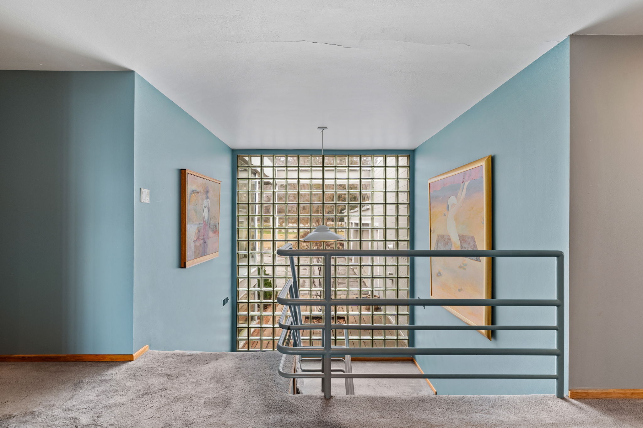 Glass block wall feature providing diffused natural light