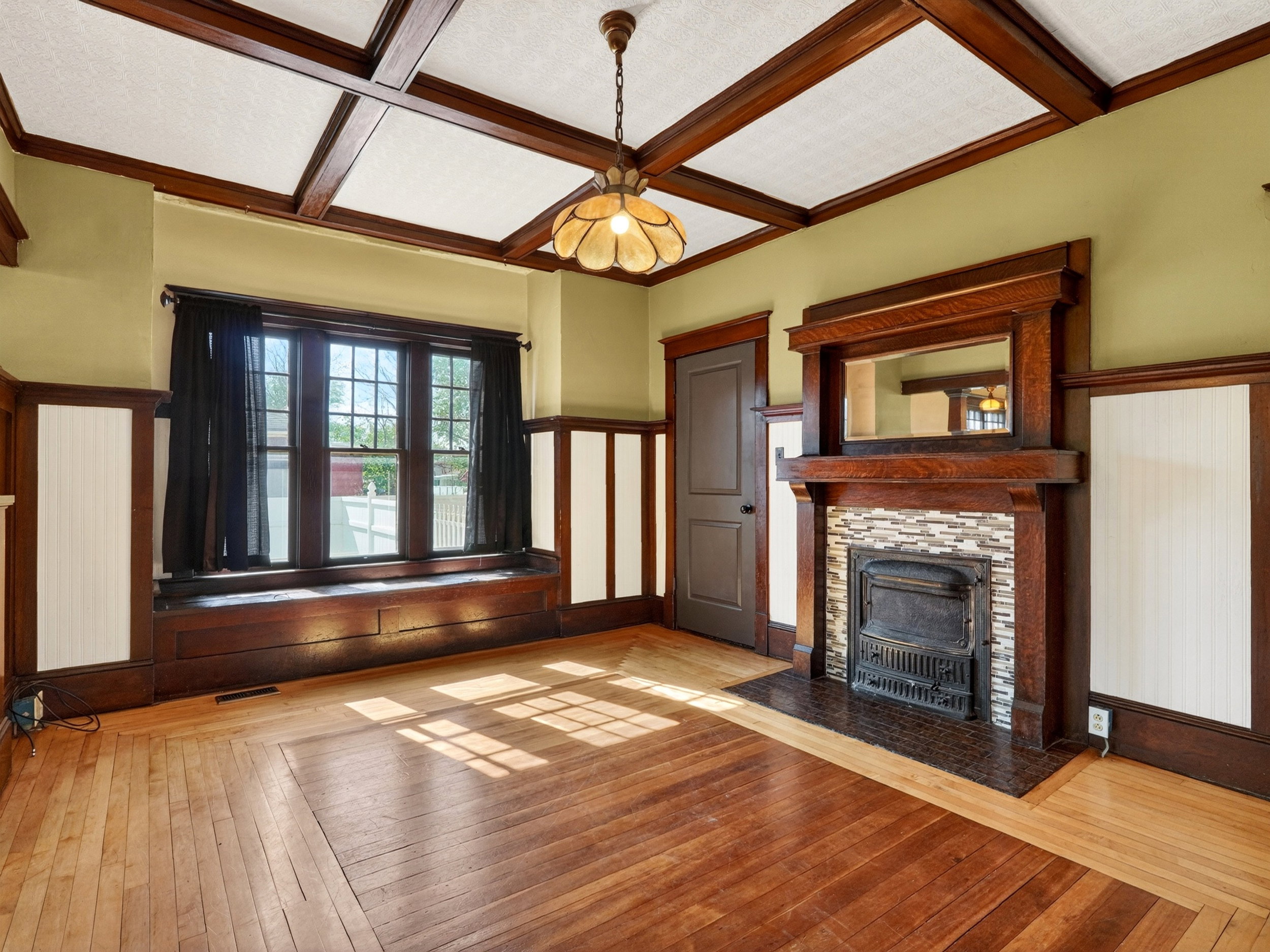 Hardwood flooring extending throughout the room
