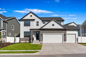 Photo of another home with similar exterior. This home is currently under construction.