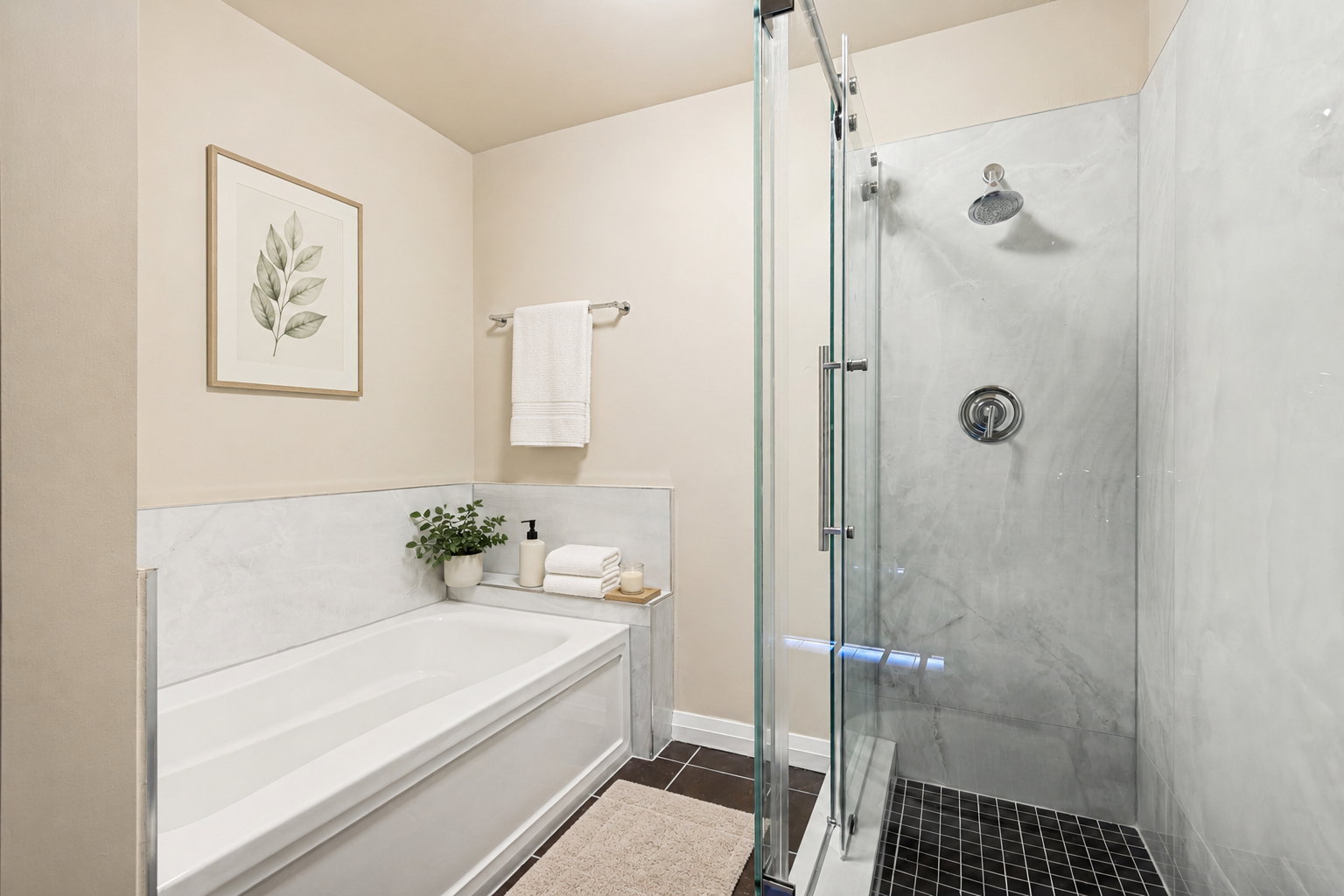 Bathroom featuring a built-in soaking tub with a white paneled skirt, a walk-in shower with a frameless glass enclosure, white veined wall paneling, and dark square tile flooring