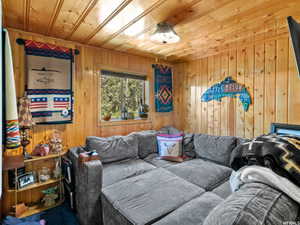 Pine paneling throughout, featuring a natural wood finish