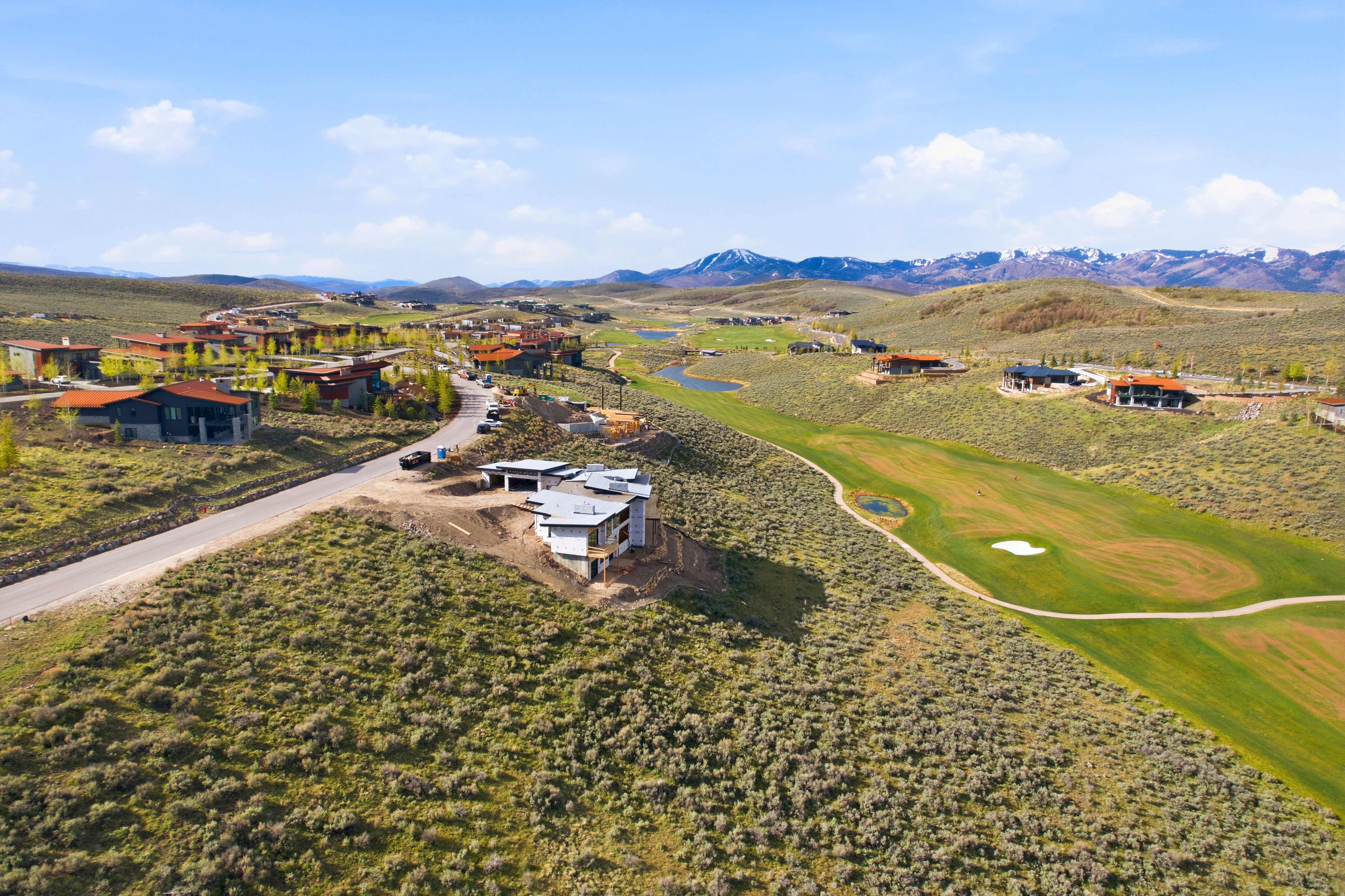 Modern architectural homes situated within a natural landscape